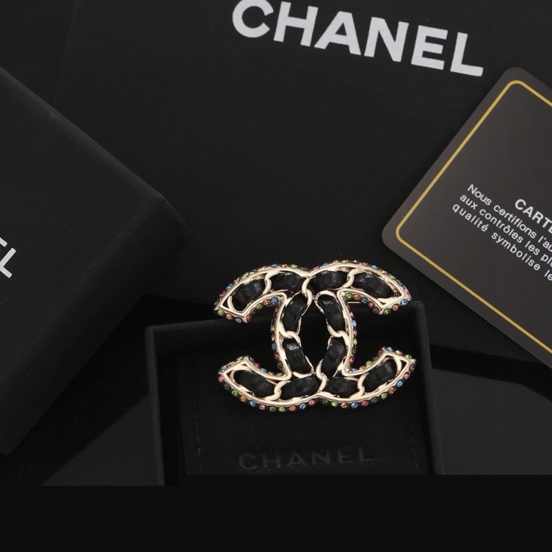 Ch*el brooches